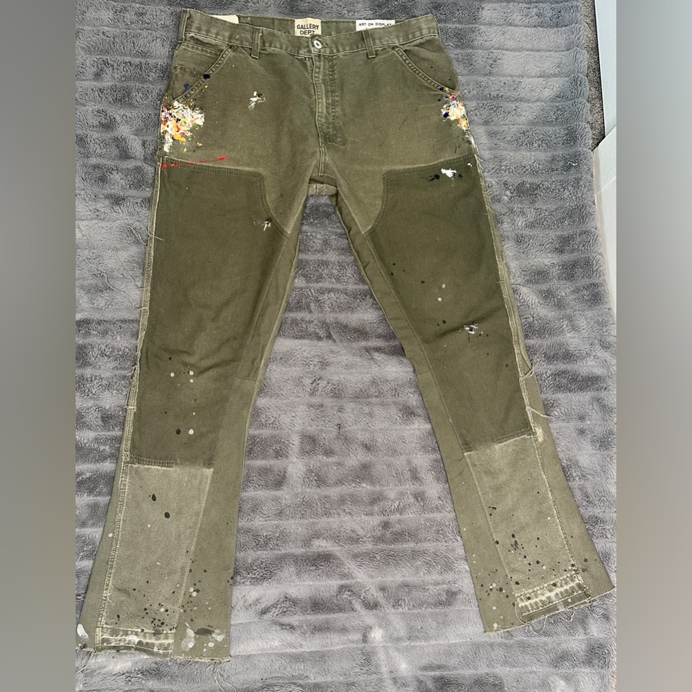 Gallery Dept. Flared Carpenter Pants in the distinguished "Olive Green" hue.